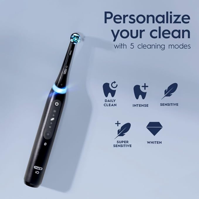 Oral-B iO Deep Clean + Whiten Rechargeable Electric Toothbrush with Visible Pressure Sensor 2 Minute Timer 5 Cleaning Settings 1 iO5 Limited 3 Toothbrush Heads Travel Case &amp Refill Holder Bl