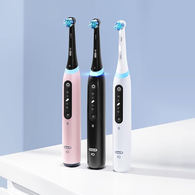 Oral-B iO Deep Clean + Whiten Rechargeable Electric Toothbrush with Visible Pressure Sensor 2 Minute Timer 5 Cleaning Settings 1 iO5 Limited 3 Toothbrush Heads Travel Case &amp Refill Holder Wh
