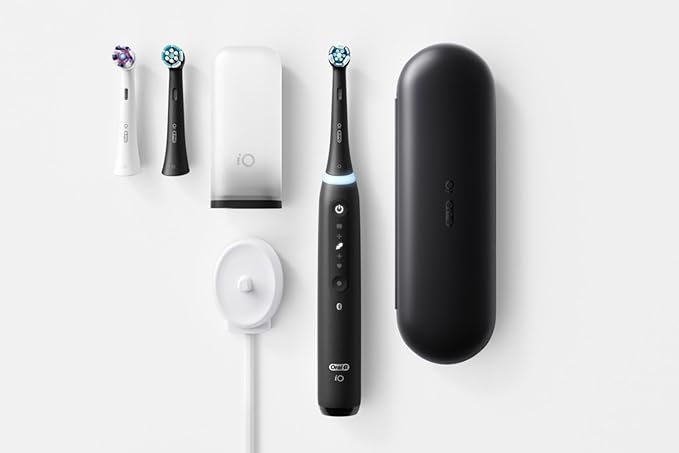 Oral-B iO Deep Clean + Whiten Rechargeable Electric Toothbrush with Visible Pressure Sensor 2 Minute Timer 5 Cleaning Settings 1 iO5 Limited 3 Toothbrush Heads Travel Case &amp Refill Holder Bl