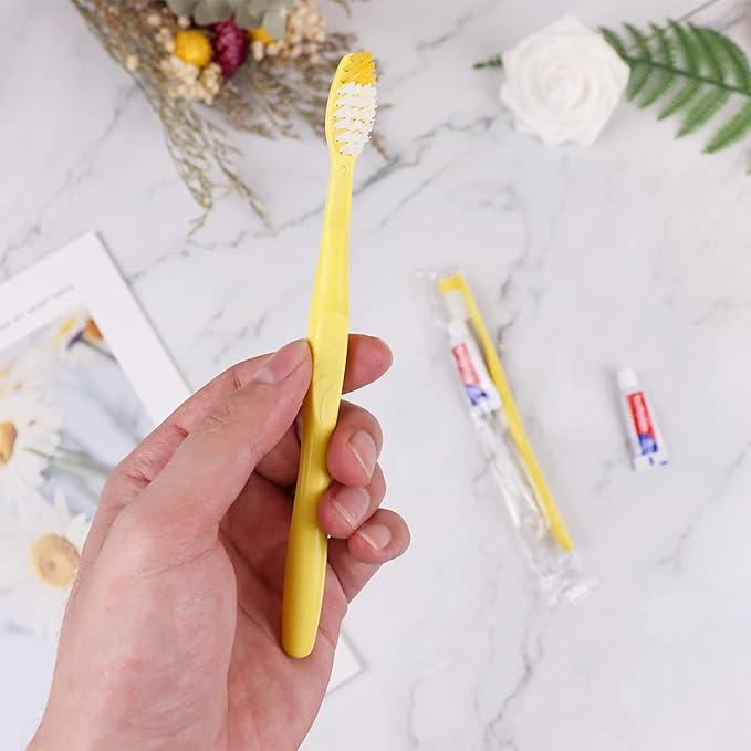 Disposable Toothbrushes with Toothpaste100 Pack Yellow Hollow Individually Wrapped Disposable Travel Toothbrushes Kit in Bulk for HomelessNursing HomeHotelCharity