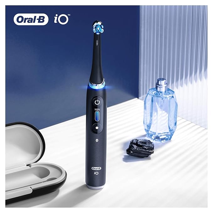 Oral-B iO Ultimate Clean Electric Toothbrush Head Twisted &amp Angled Bristles for Deeper Plaque Removal Pack of 4 Suitable for Mailbox Black
