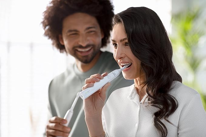 Philips Sonicare 4100 Rechargeable Electric Toothbrush with Pressure Sensor 2 Intensity Settings SmarTimer and QuadPacer 14-Day Battery Life White Model HX3681/23