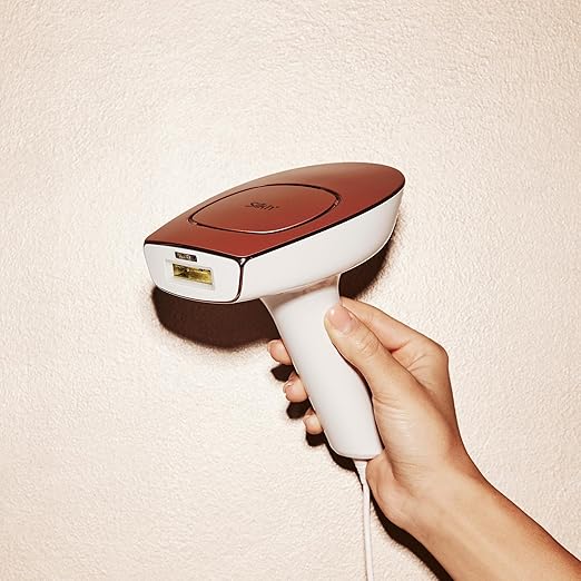 Silk'n IPL Motion Premium Device with Permanent Hair Reduction for Women and Men Gentle Touch and Glide Technology for Face &amp Body 600000 Flashes Auto-Adjust System Rose Gold