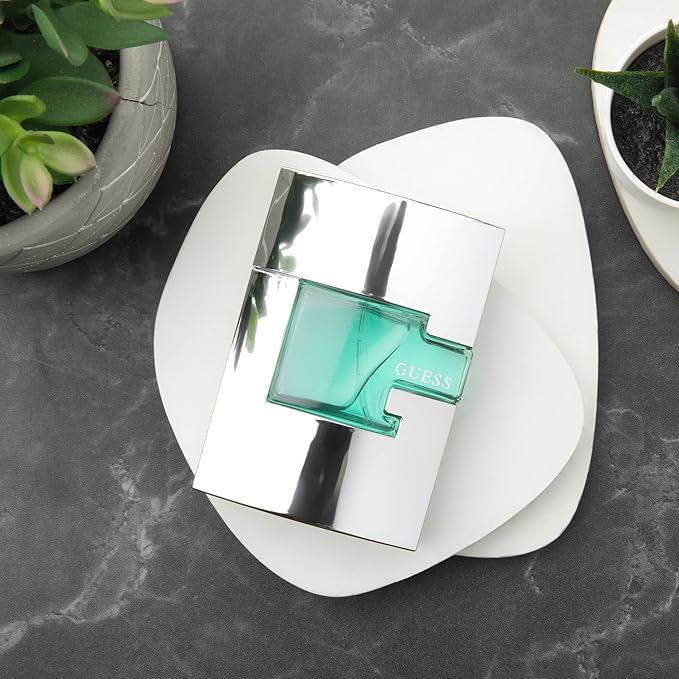 GUESS Man Eau de Toilette 3 Piece Gift Set - Cologne Spray 2.5 Fl. Oz. Deodorizing Body Spray 6.0 Oz. &amp Shower Gel 6.7 Fl. Oz.